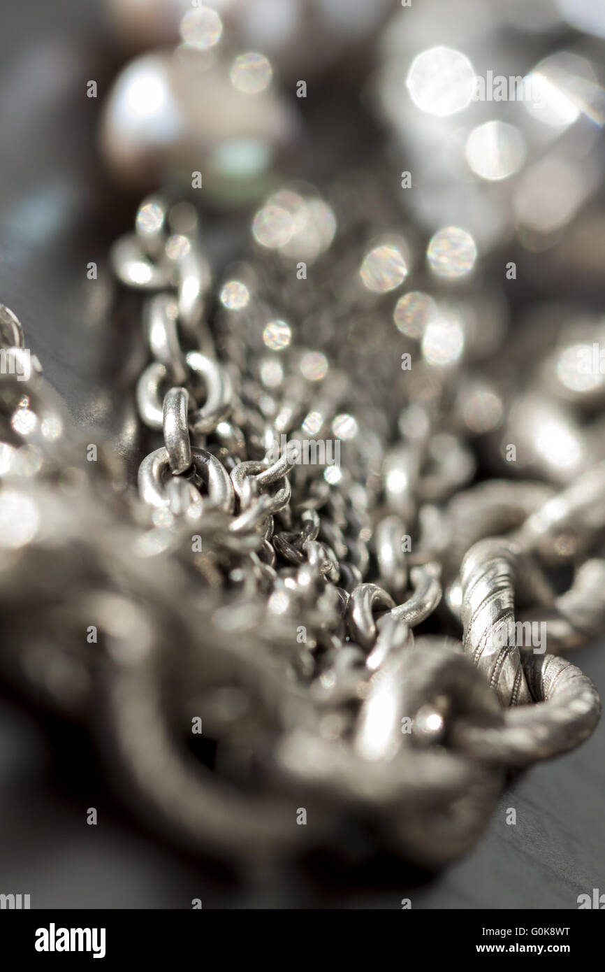 Assorted silver costume jewellery Stock Photo Alamy