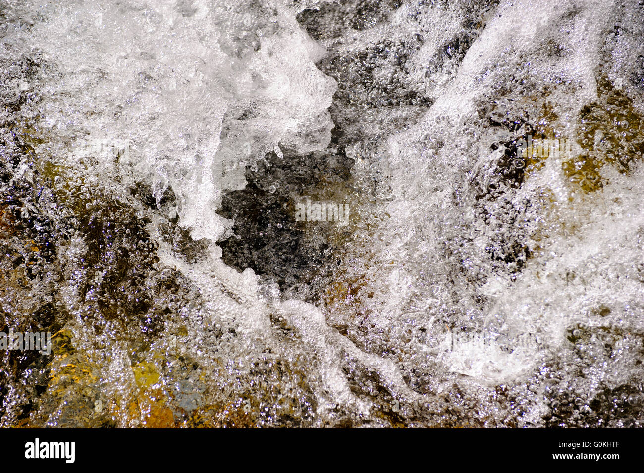 alpin stream with water cascade in detail Stock Photo