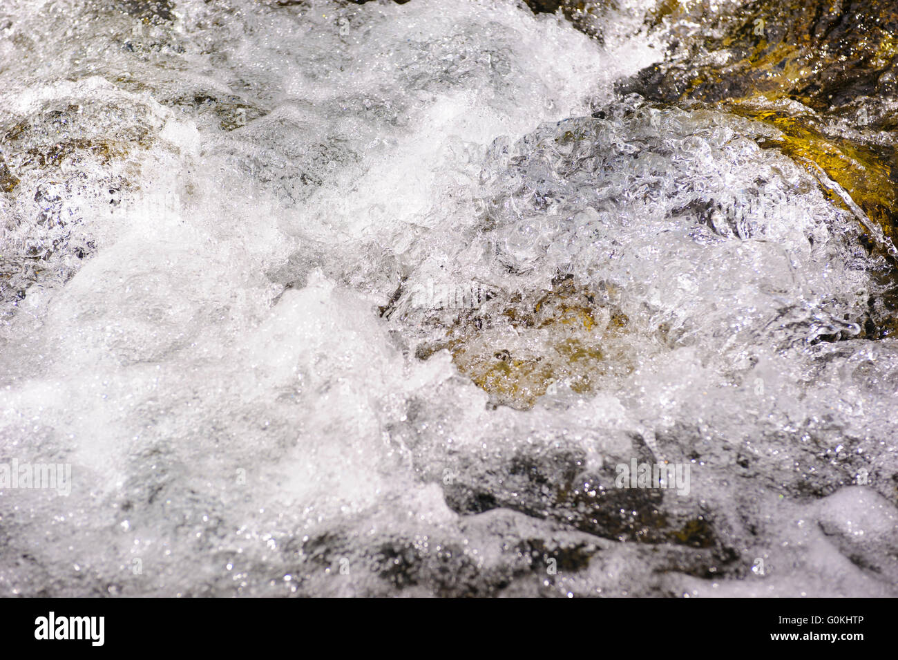 alpin stream with water cascade in detail Stock Photo