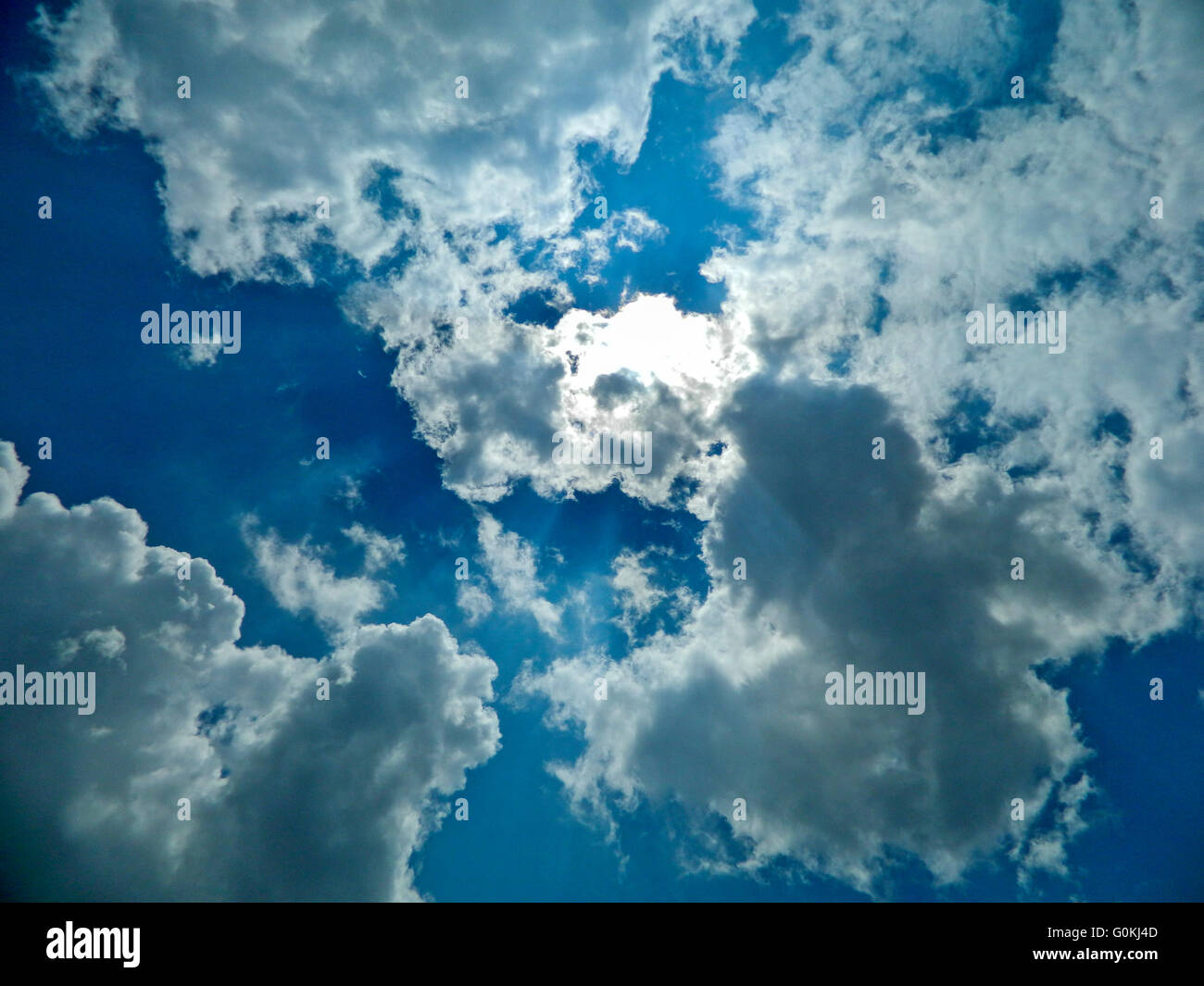 Summer day and the white clouds that travel blue sky Stock Photo - Alamy