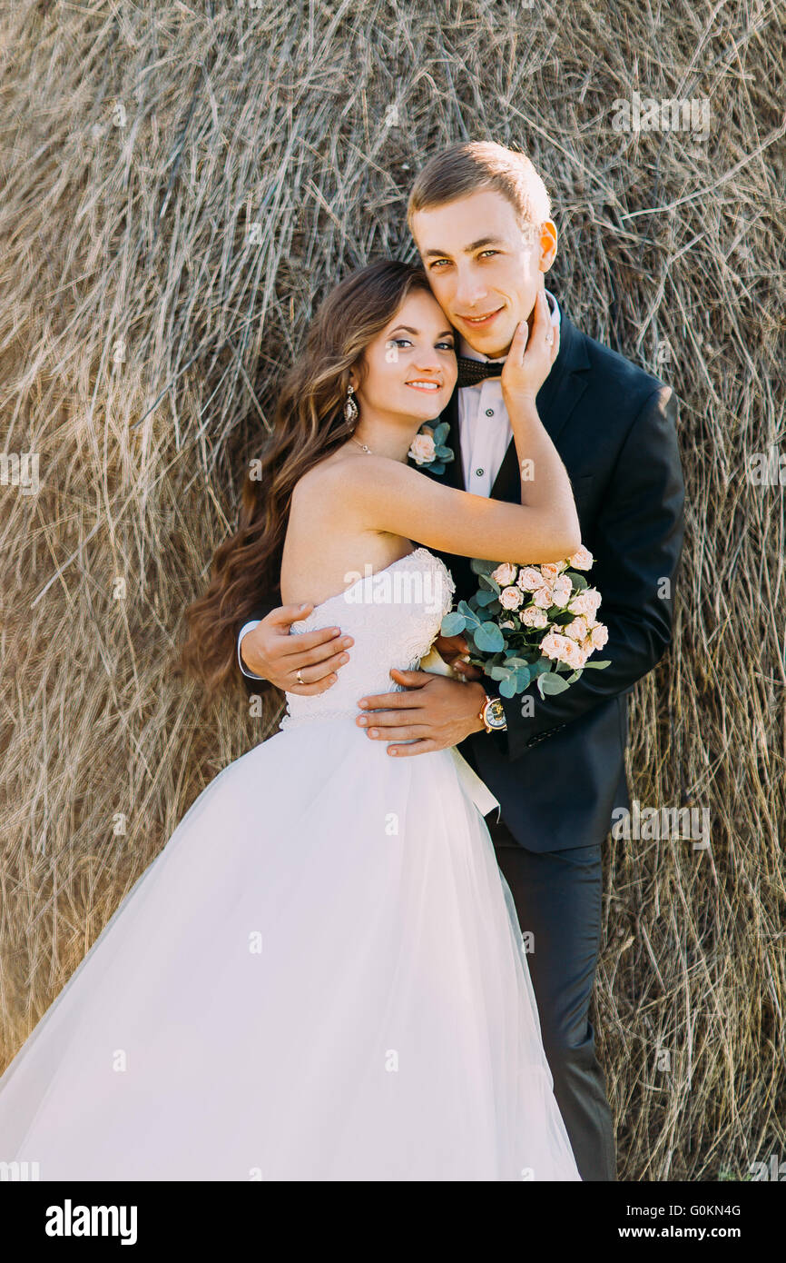 Close Up Portrait Of Happy Young Married Couple Hugging On Haystack Stock Photo Alamy Close Up Portrait Of Happy Young Married Couple Hugging On Haystack Stock Photo Alamy