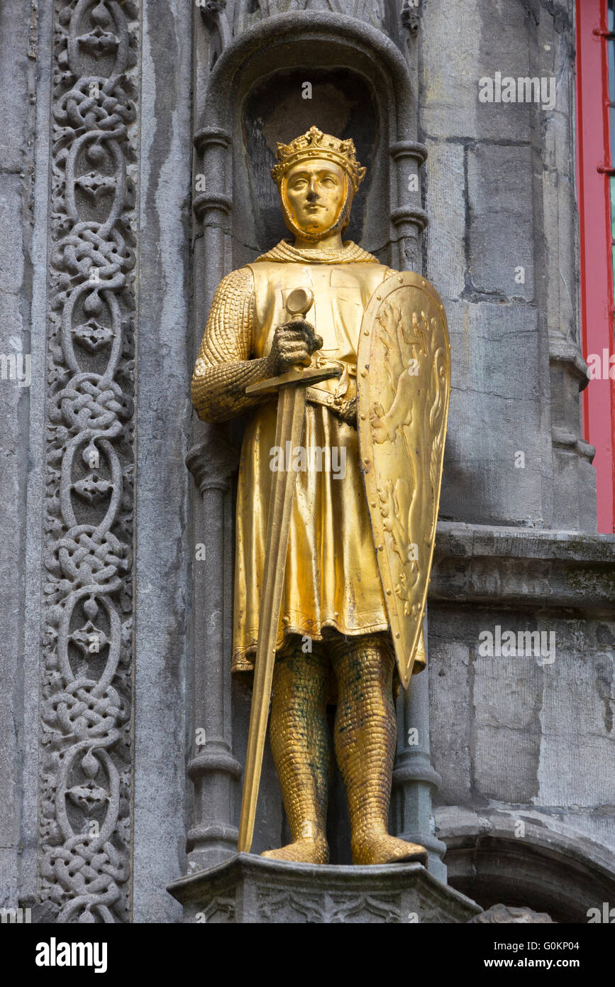 Statue on the façade of The Basilica of the Holy Blood in Burg Square, Bruges, Belgium Stock Photo