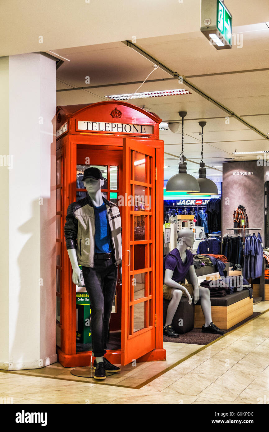 Stuttgart Galeria Kaufhof Department store. Shop mannequins and British  Telephone Box in Men's clothing area Stock Photo - Alamy