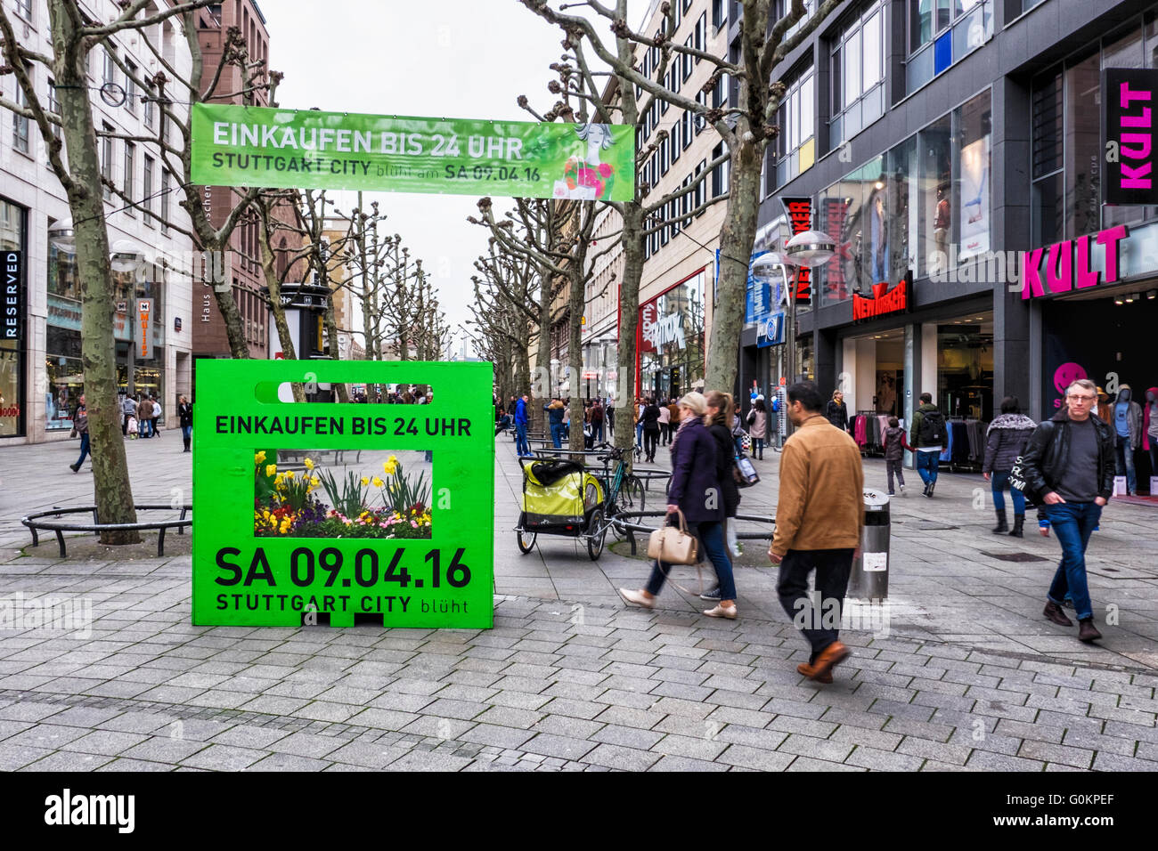 Stuttgart, Germany. Königstrasse, King street pedestrianised shopping  advertises late shopping at Spring festival Stock Photo - Alamy