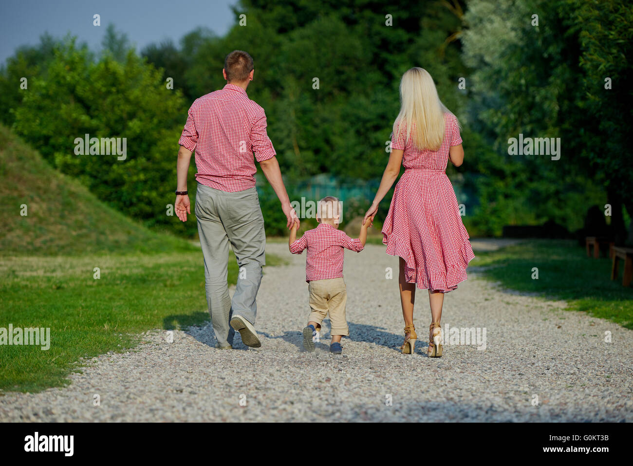 happy family from the back view Stock Photo