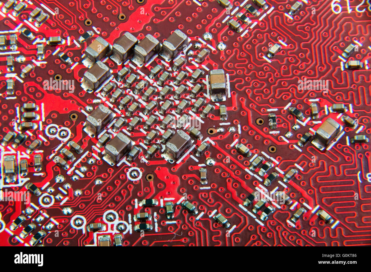 Electronic circuit board close up. Red PCB Stock Photo - Alamy