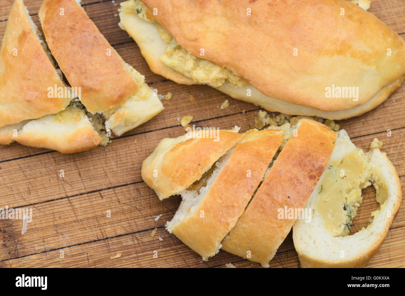 homemade buns stuffed with lentil on wooden background Stock Photo