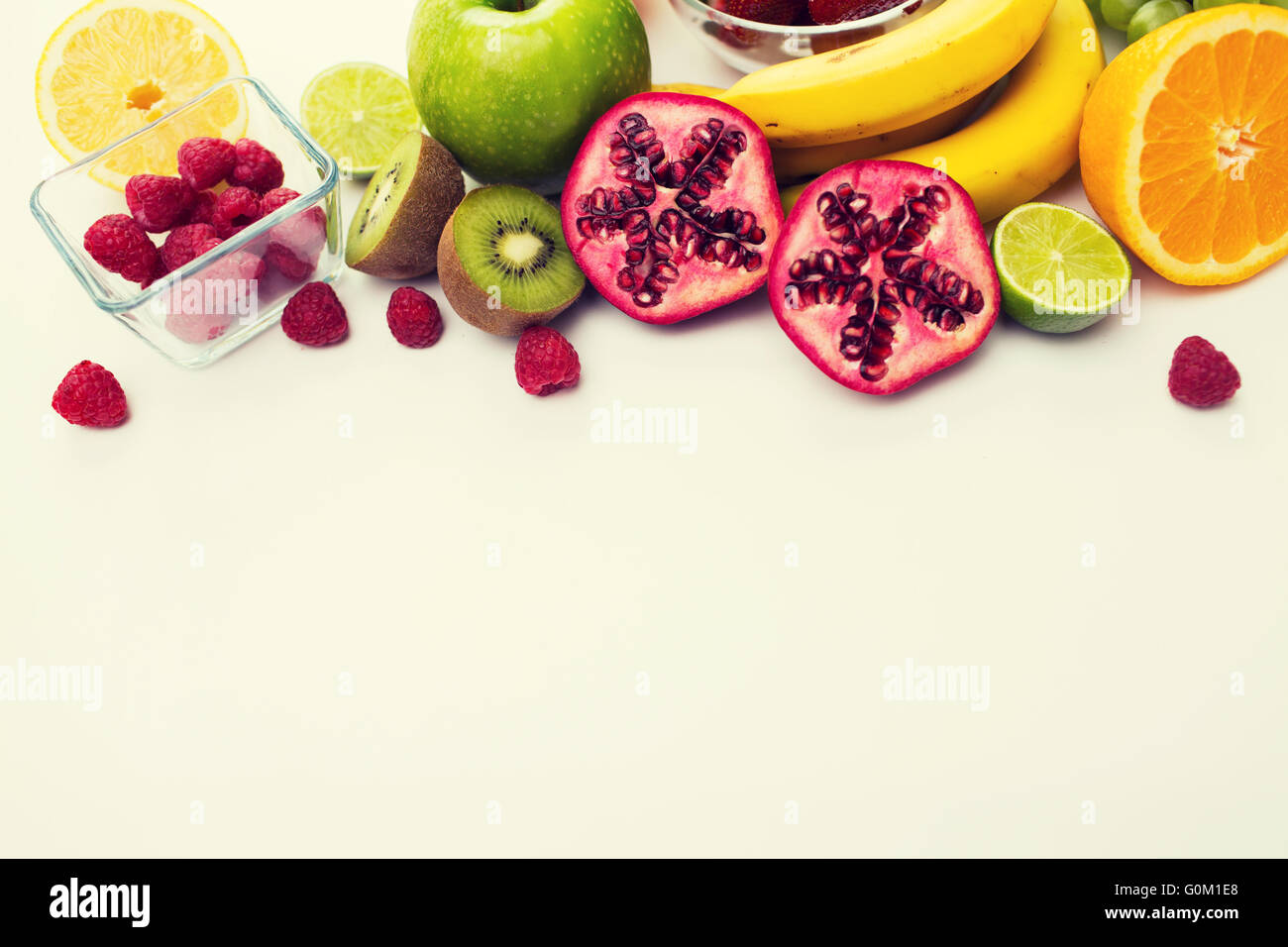 close up of fresh fruits and berries on table Stock Photo - Alamy