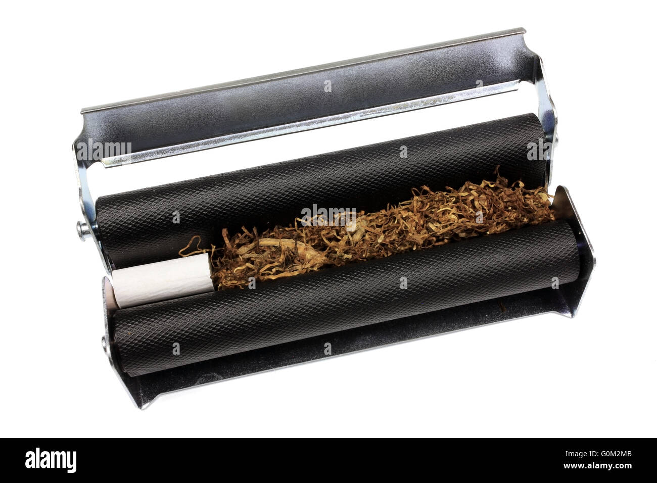 Cigarette rolling machine hires stock photography and images Alamy
