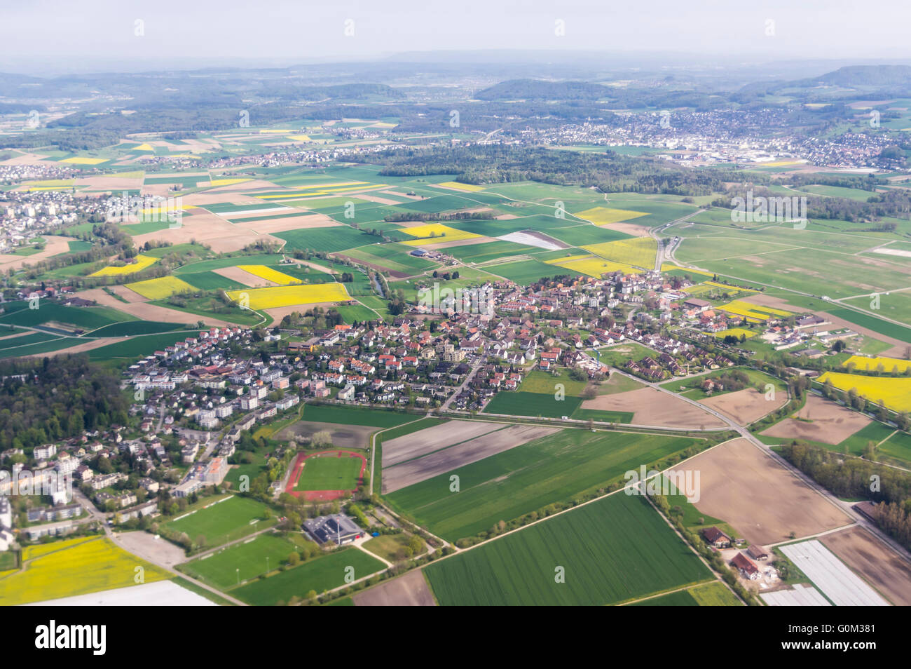 Aerial photography of crop fields and the village of Oberglatt, Canton of Zurich, Switzerland. Stock Photo
