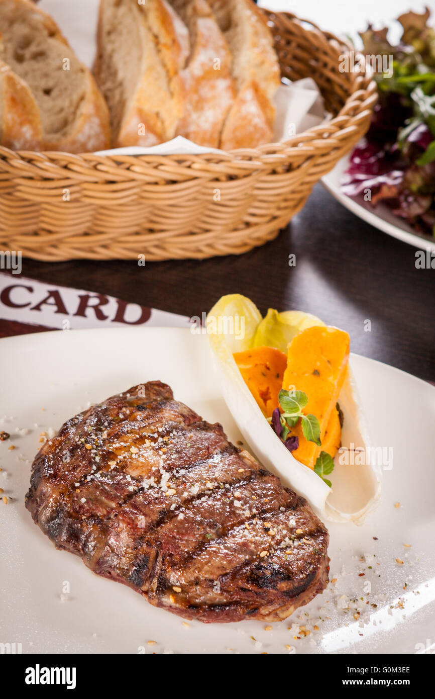 View of Grilled beef steak with seasoning Stock Photo - Alamy