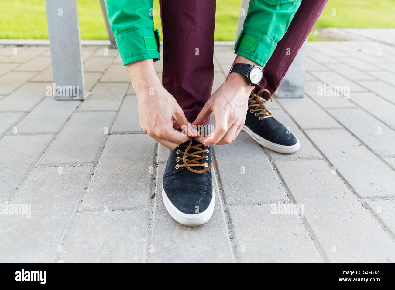 Closeup human hands tying laces hi-res stock photography and images - Alamy