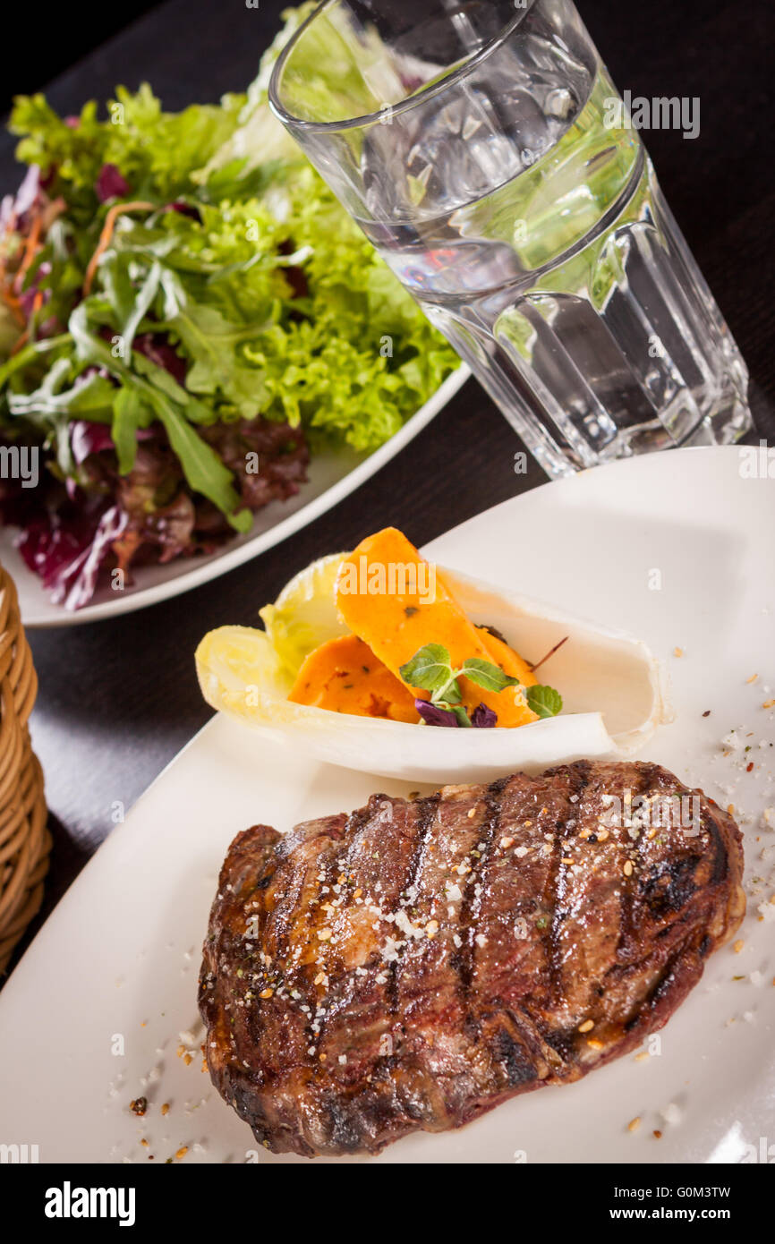 View of Grilled beef steak with seasoning Stock Photo - Alamy