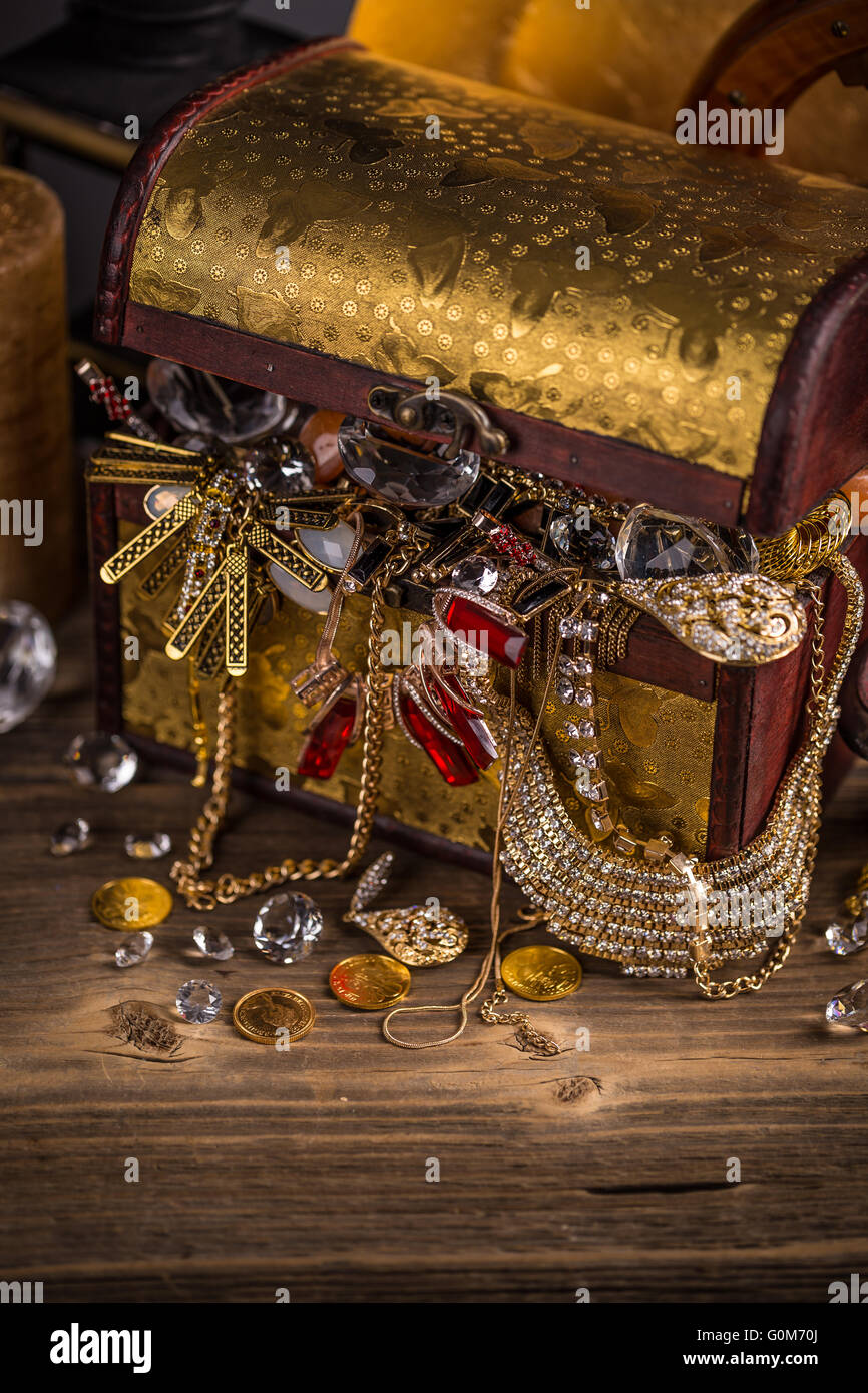 Small pirate treasure chest on wooden table Stock Photo Alamy