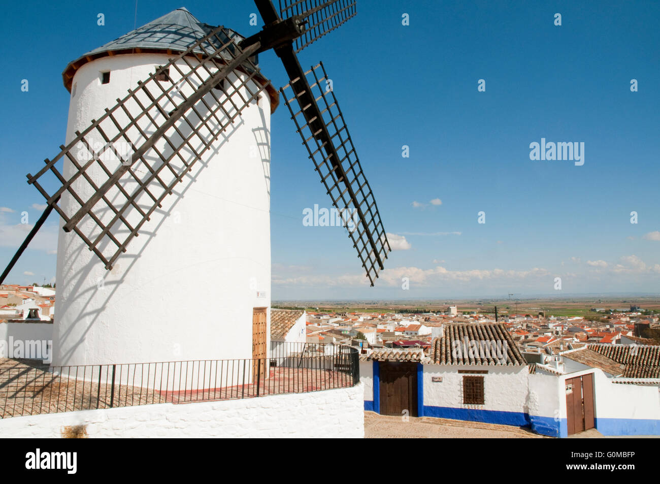 Windmill and village. Campo de Criptana, Ciudad Real province, Castilla La Mancha, Spain. Stock Photo