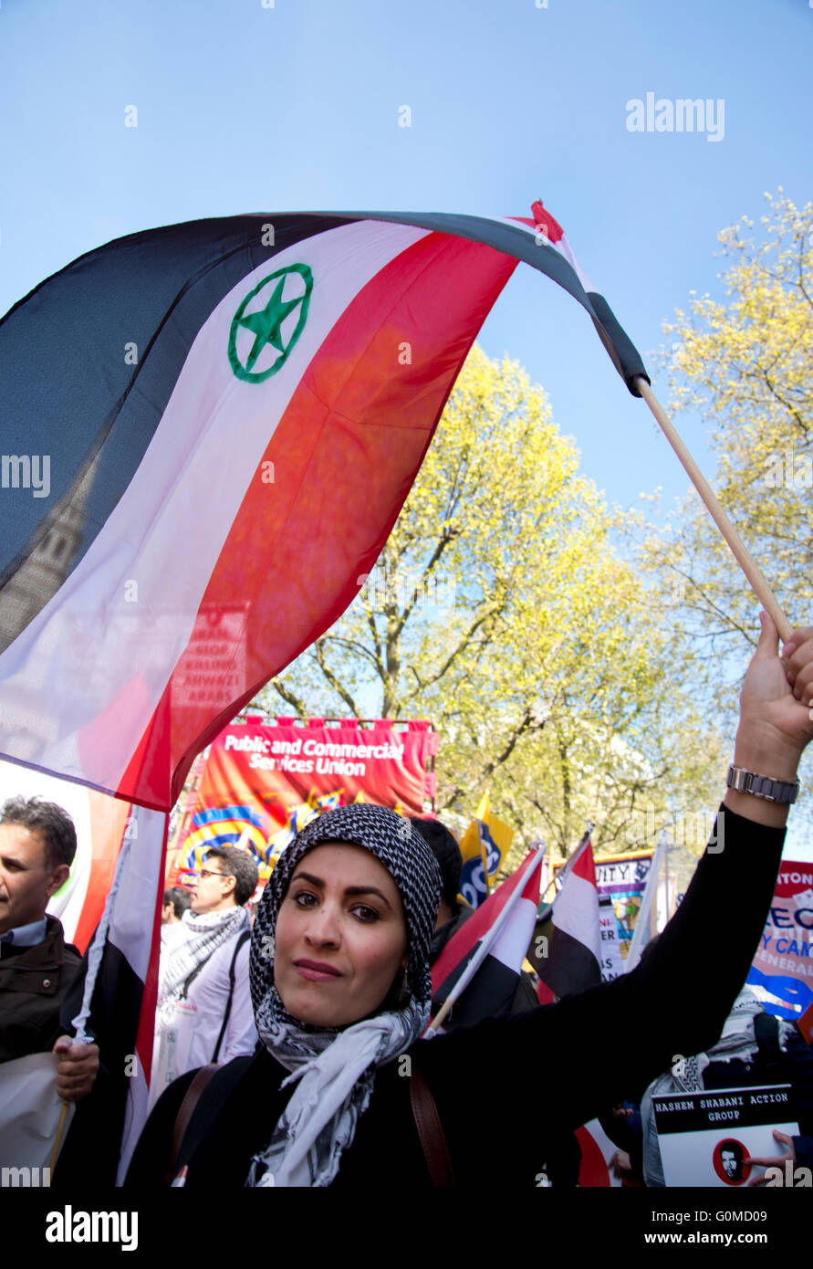 Clerkenwell.International workers Day. A woman from an Iranian opposition group waves an Ahvaz flag. Stock Photo