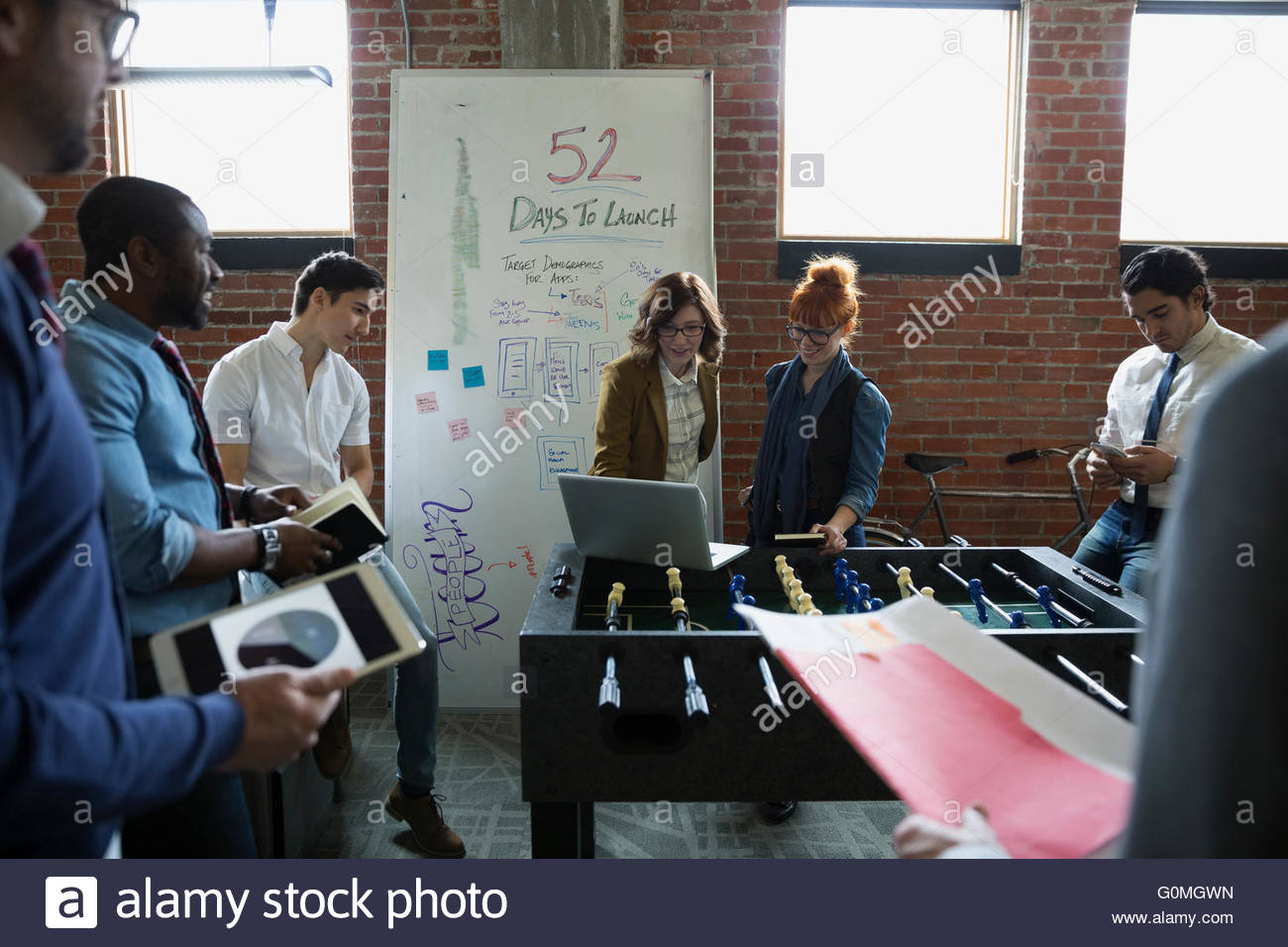 Entrepreneurs brainstorming in office Stock Photo
