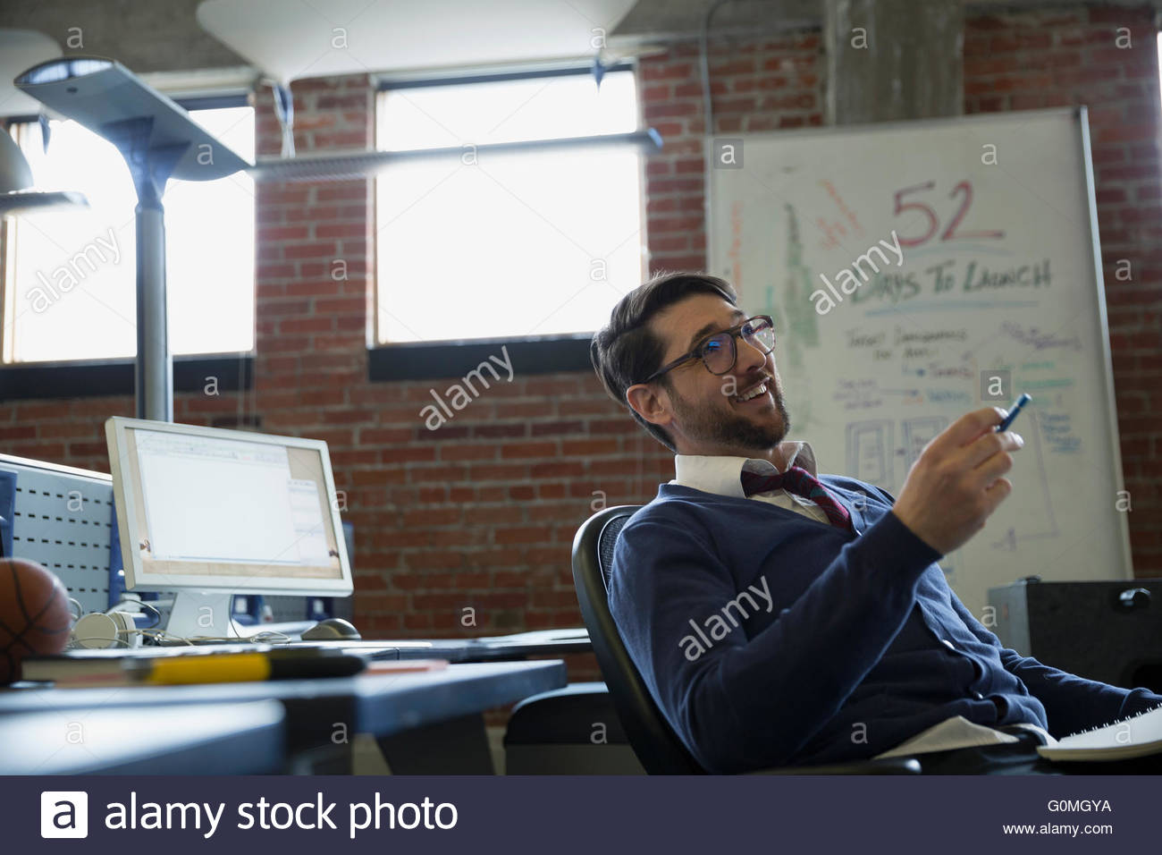 Entrepreneur brainstorming in office Stock Photo