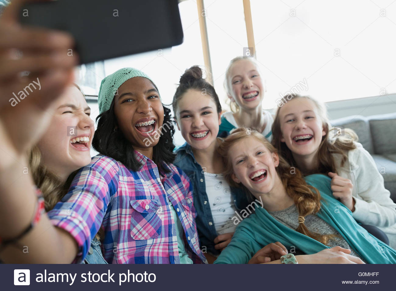 Enthusiastic girls taking selfie Stock Photo