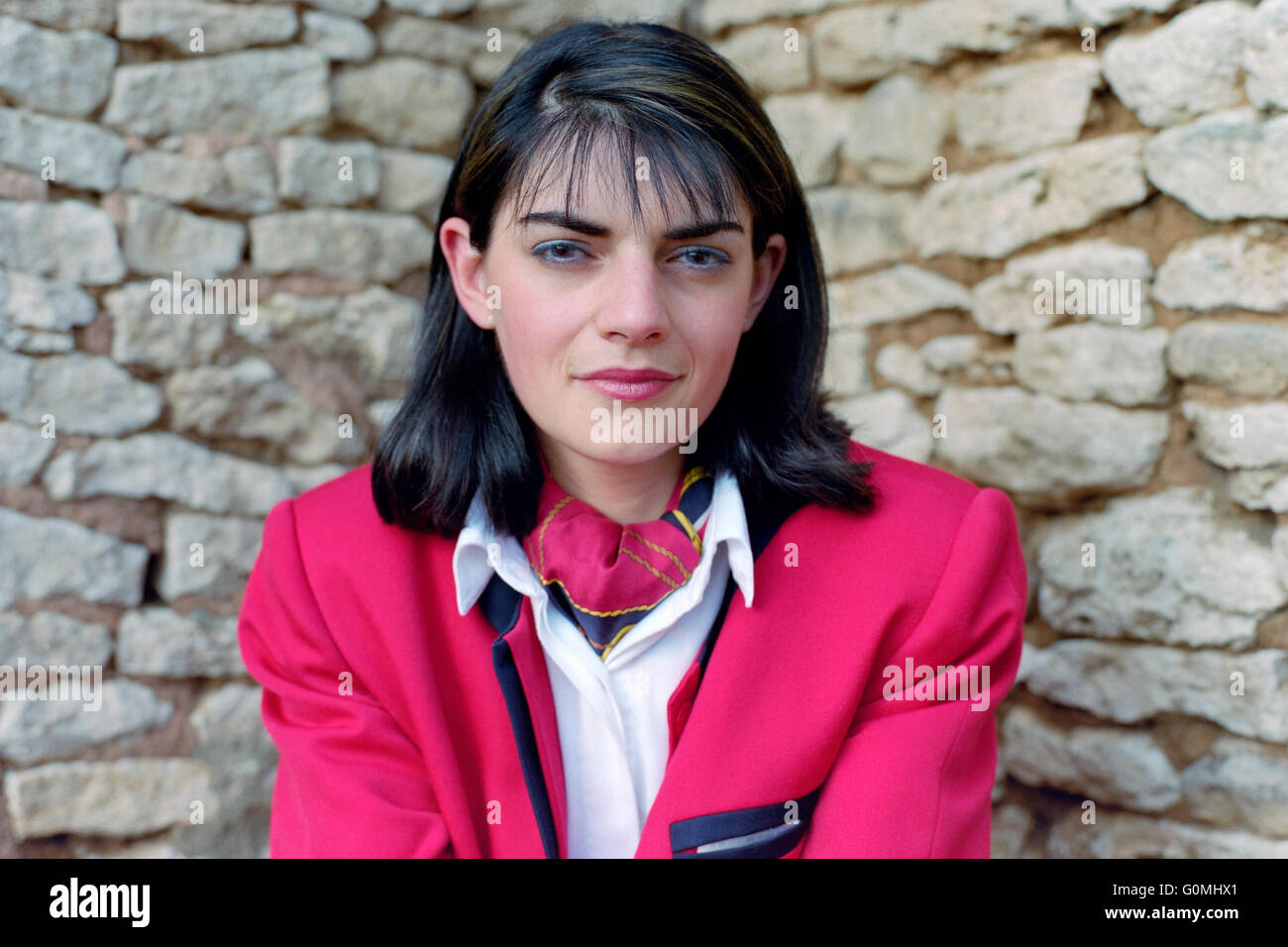 young pretty female brittany ferries hostess in uniform poses for a