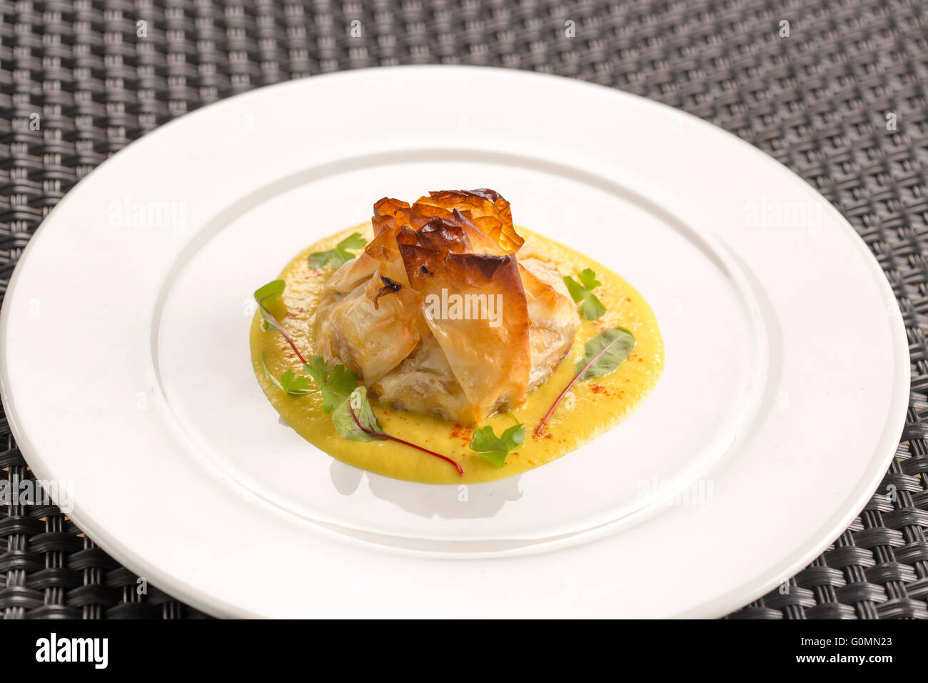 Filo parcel of butternut squash, goat's cheese & basil, yellow pepper