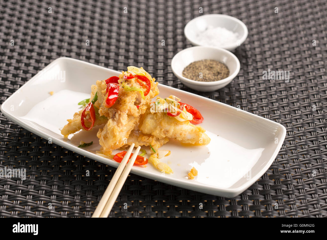 Salt & pepper squid with chilli, ginger & spring onion Stock Photo Alamy