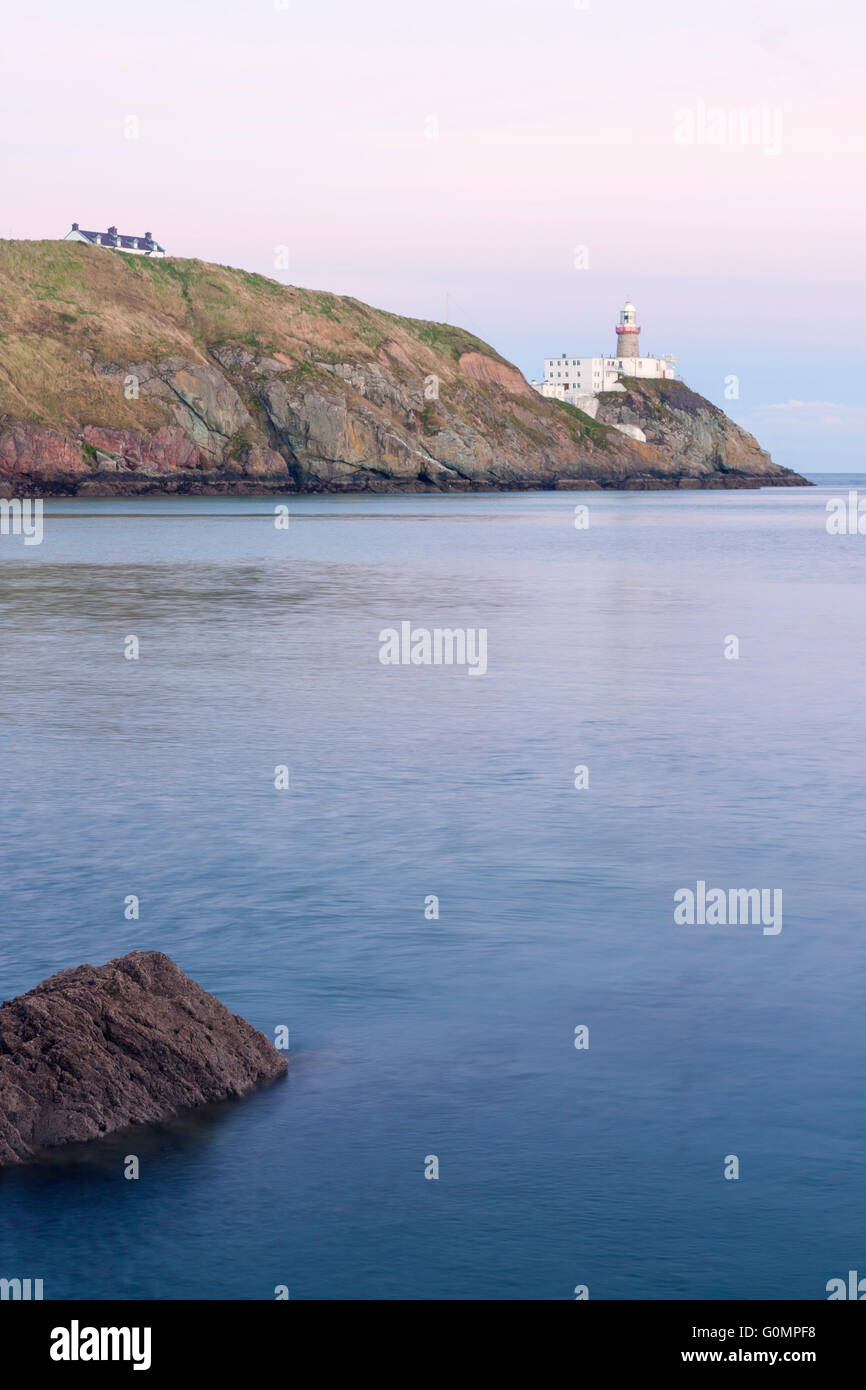 Baily lighthouse at the sunset in Howth peninsula, Dublin, Ireland Stock Photo