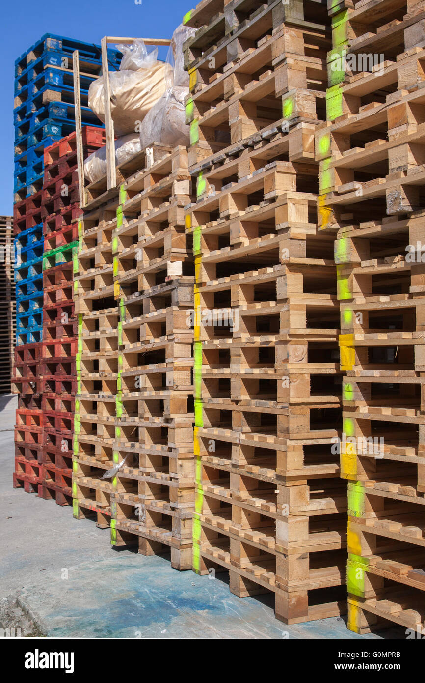 Euro-pallet or EPAL-palletis, the standard European pallet as specified by  the European Pallet Association (EPAL). Large number of stacked Euro  standard sized wooden pallets which are reusable and ideal for loading &