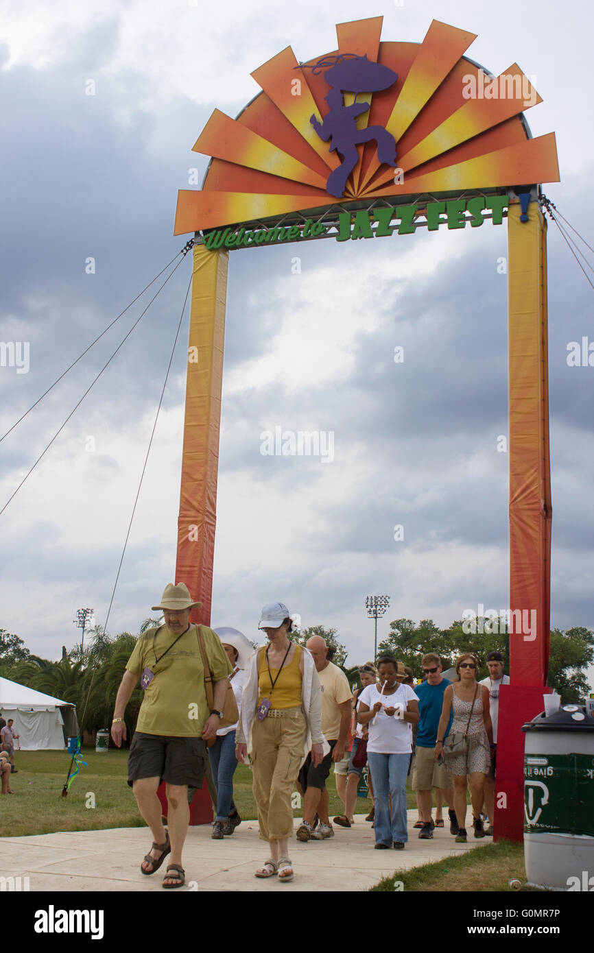 Jazz Fest spectators leaving the Fairgrounds after a day at the N.O. Jazz & Heritage Festival. Stock Photo