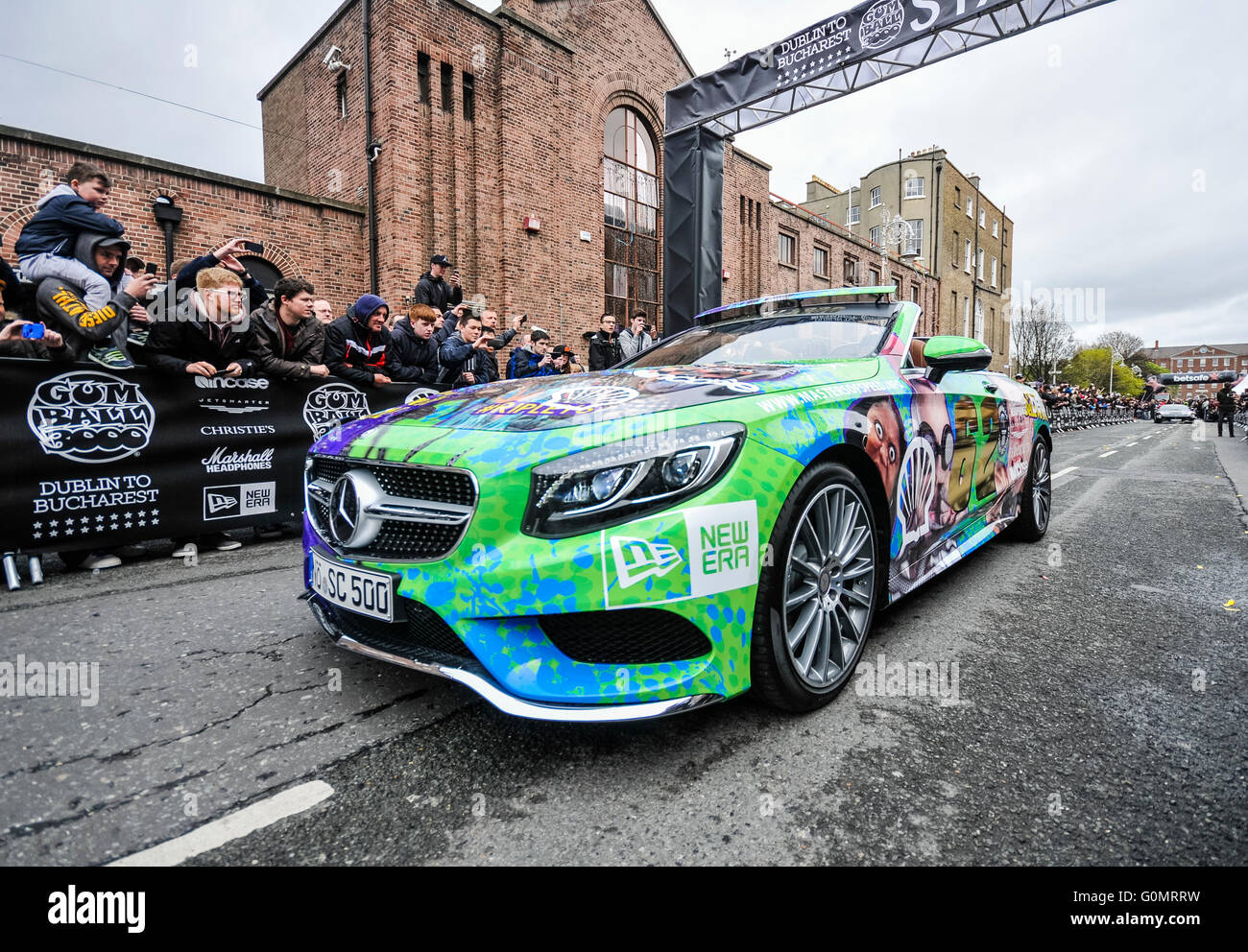 DUBLIN, IRELAND. MAY 01 2016 - The Ripley's Believe-it-or-not Mercedes S Class Cabriolet roars past the start line as the Gumball 3000 begins its 6 day drive to Bucharest. Stock Photo