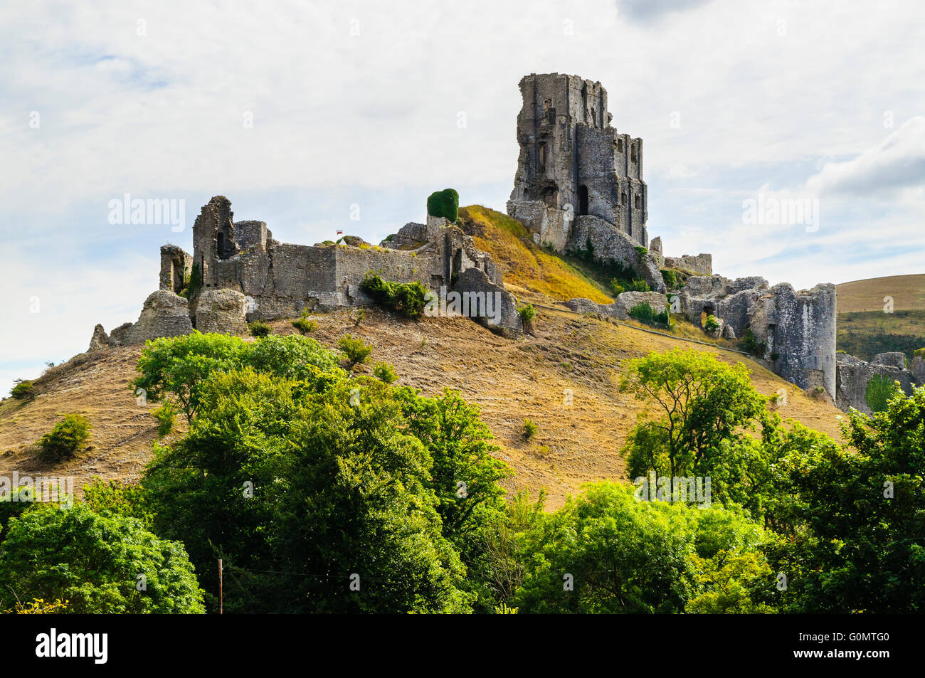 The dramatic ruins of Corfe Castle on the Isle of Purbeck Dorset Stock Photo