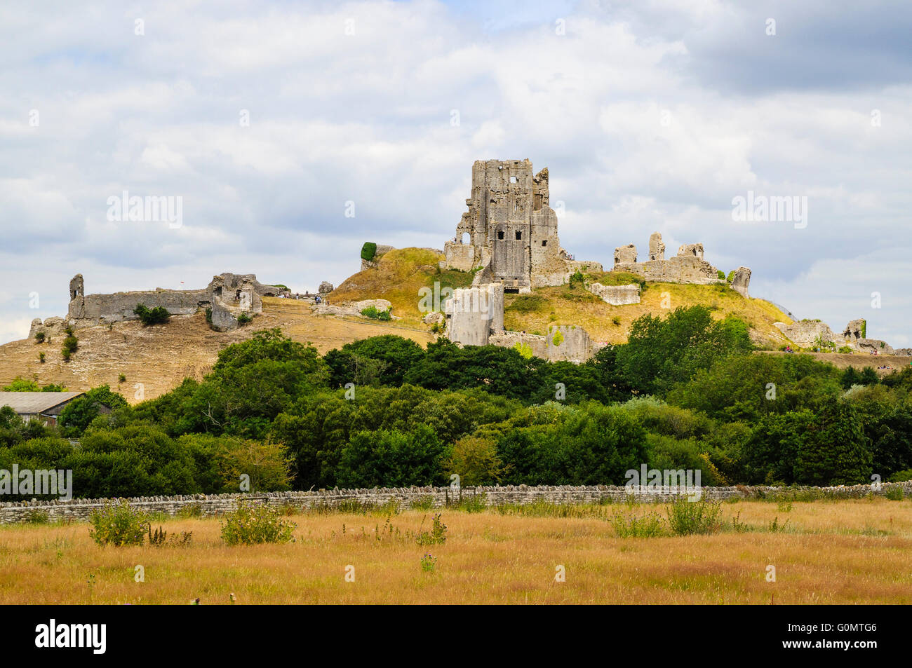 The dramatic ruins of Corfe Castle on the Isle of Purbeck Dorset Stock Photo
