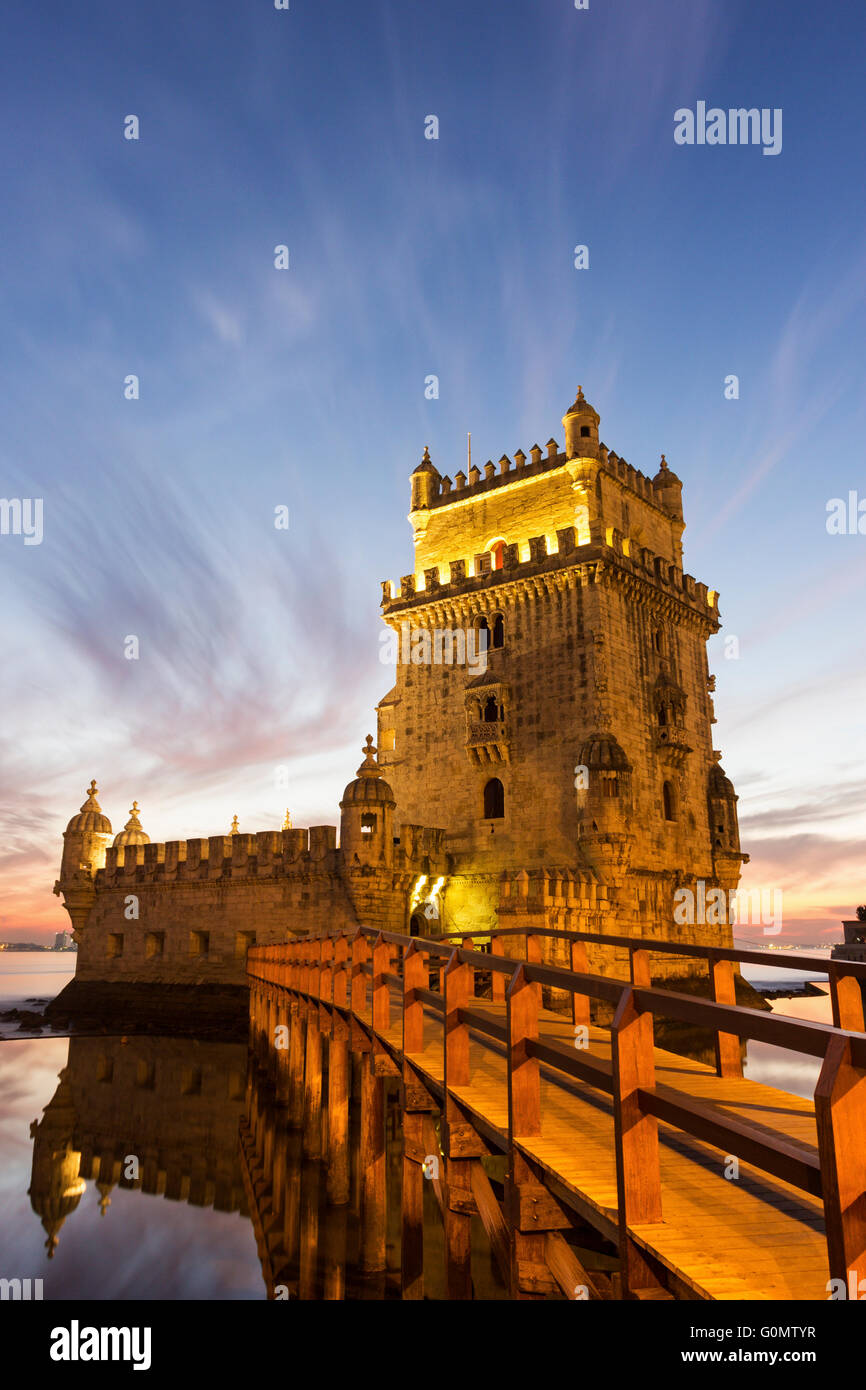 The iconic facade of the Tower of Belem on the bank of the Tagus River ...