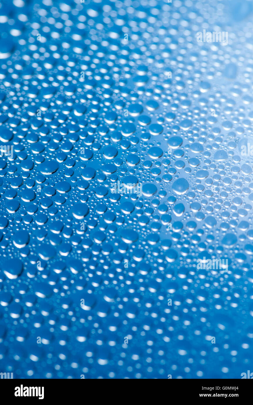 close-up of water drops on the blue background Stock Photo - Alamy