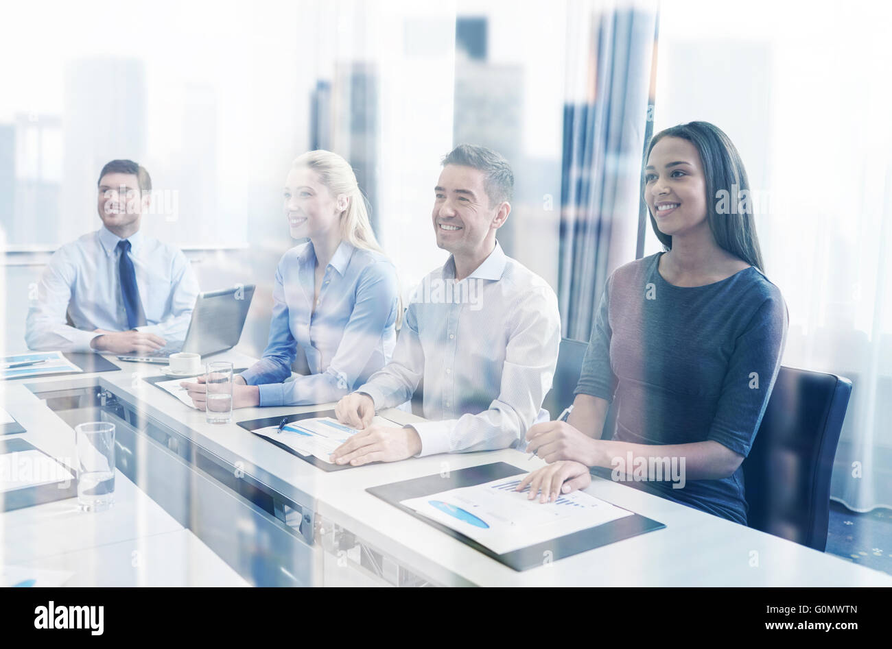 smiling business people meeting in office Stock Photo - Alamy