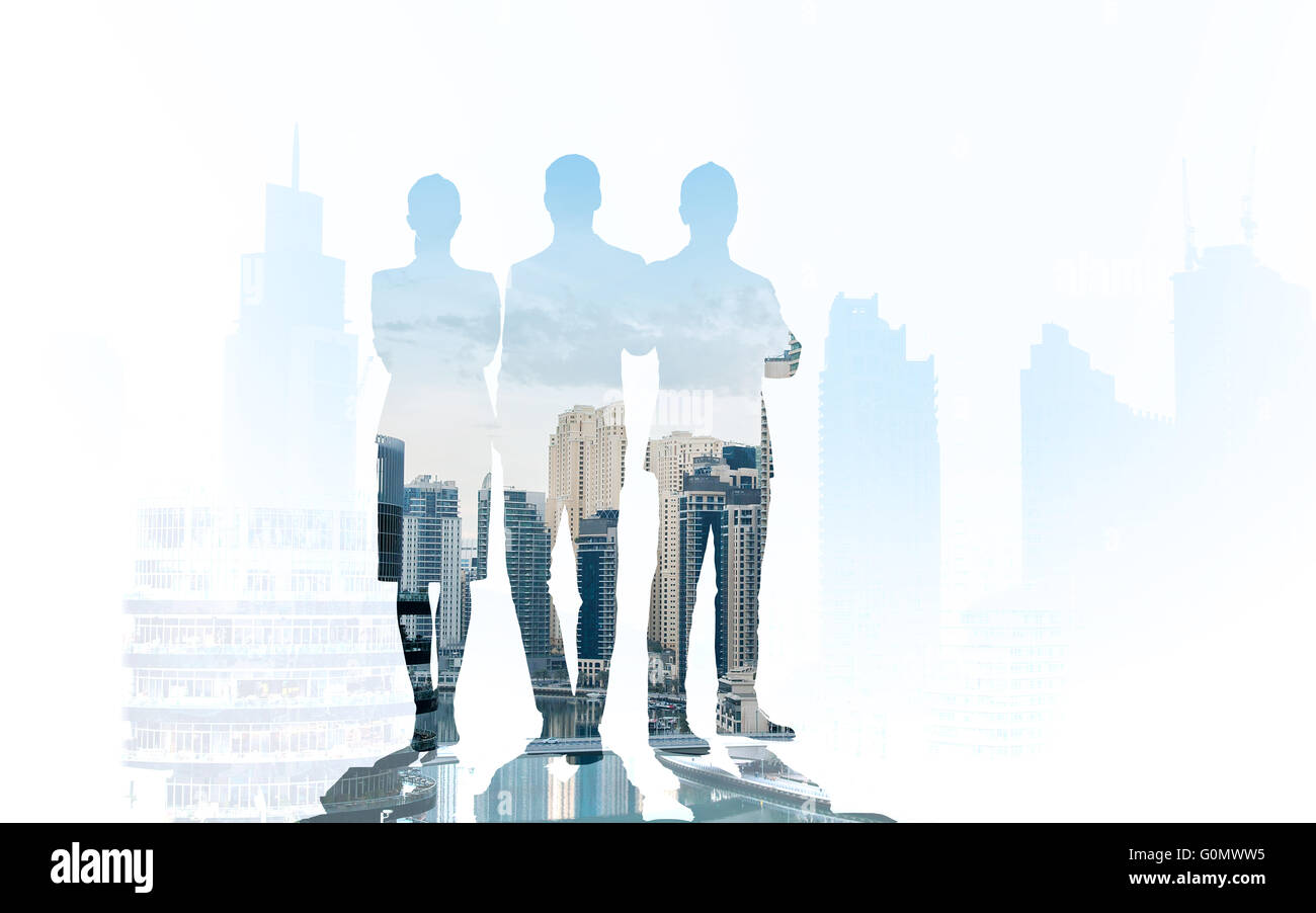 business people silhouettes over city background Stock Photo - Alamy