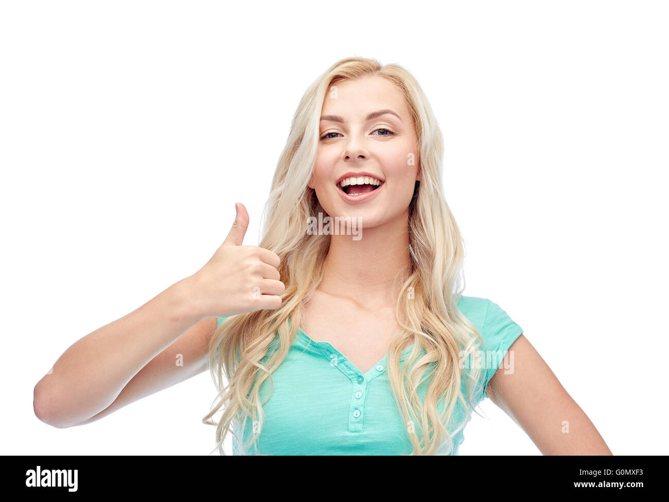 happy woman or teenage girl showing thumbs up Stock Photo - Alamy