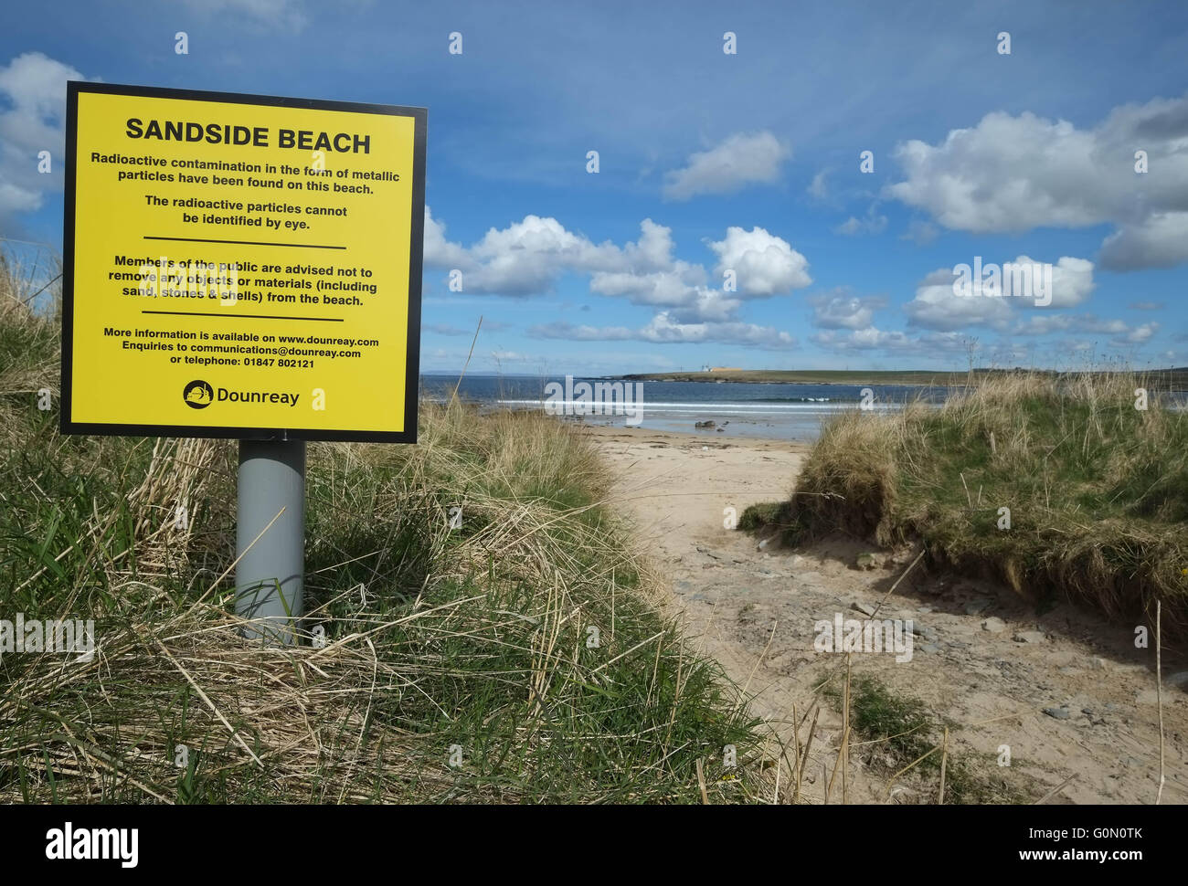 20/04/2016, Sign's warning of radioactive contamination in the form of metallic particles at Sandside beach, Reay, Caithness, UK Stock Photo
