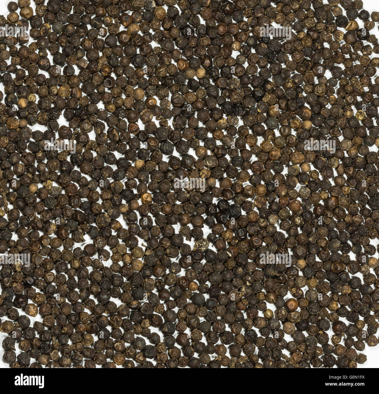 A lot of black pepper seeds Stock Photo