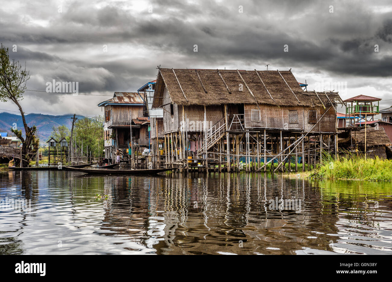 Wooden houses on piles inhabited by the tribe of Inthar, Inle Lake, Myanmar Stock Photo
