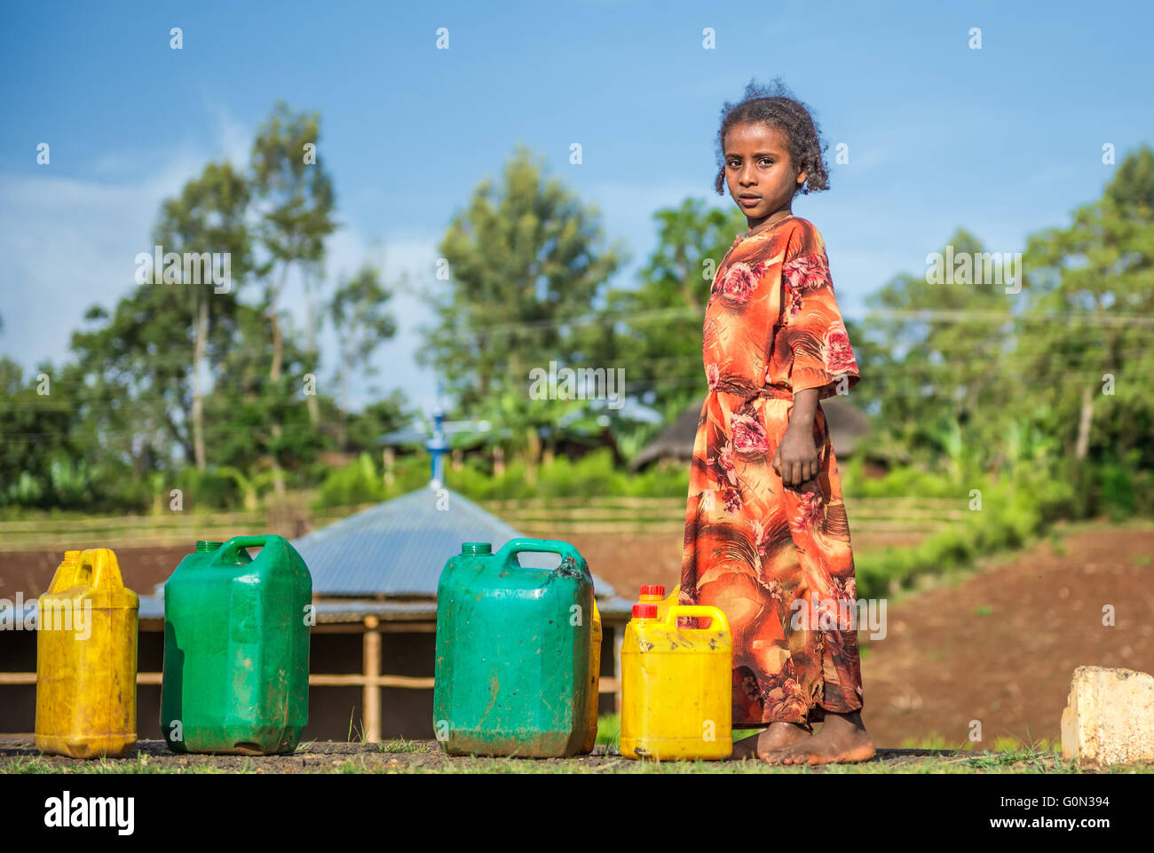 Young ethiopian girl going for water near Addis Ababa. Stock Photo