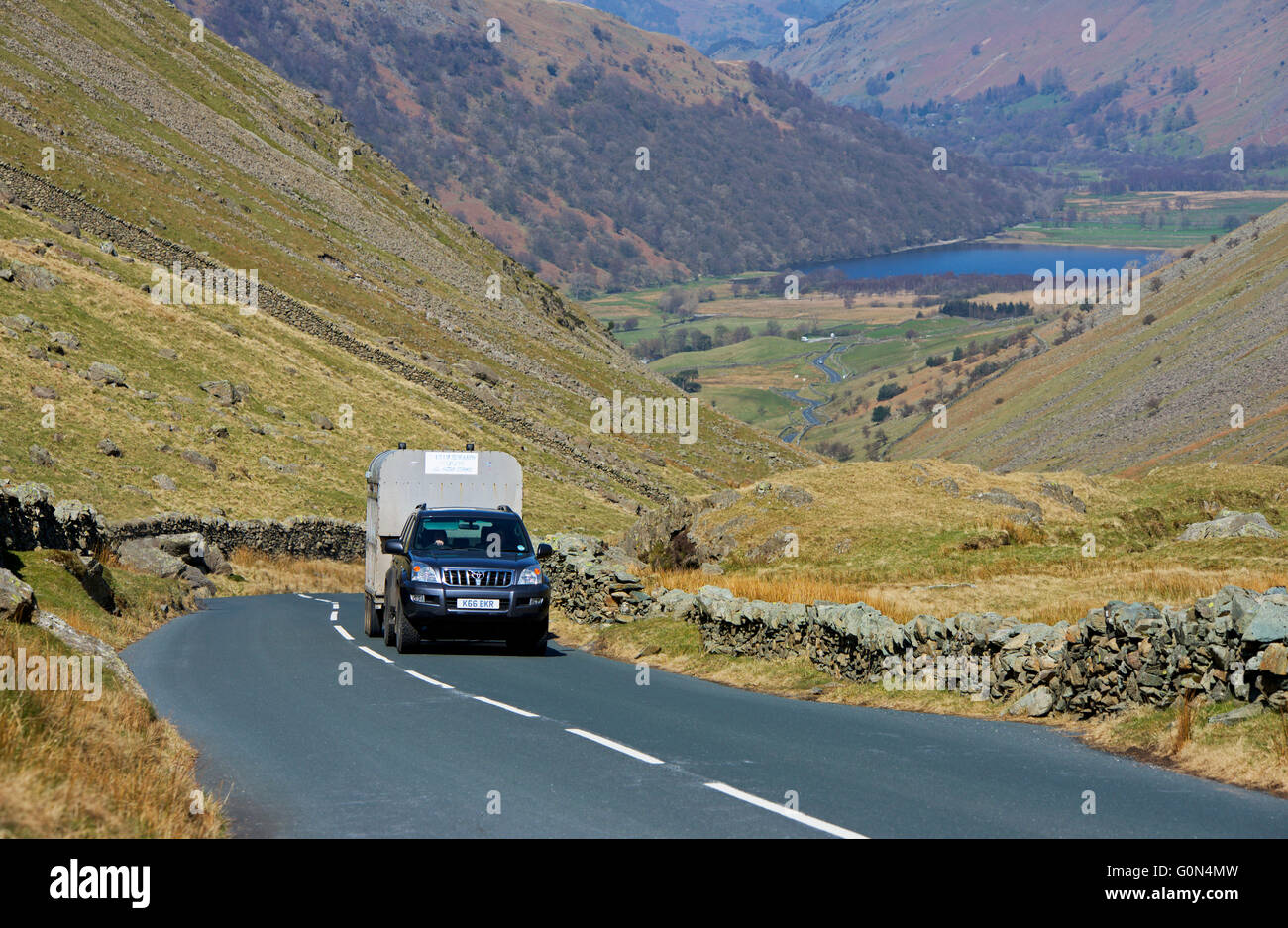 Car pulling trailer up Kirkstone Pass (A592), Lake District National