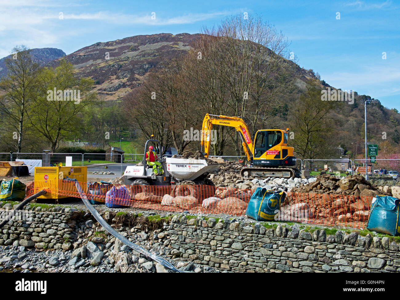 Repairing flood damage in the village of Glenridding, Lake District National Park, Cumbria, England UK Stock Photo