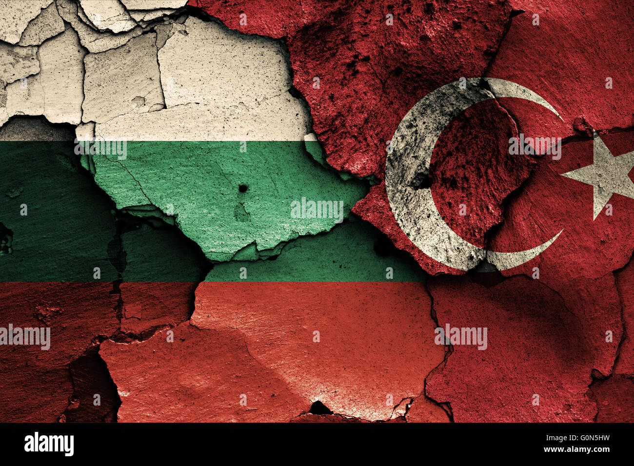 flags of Bulgaria and Turkey painted on cracked wall Stock Photo
