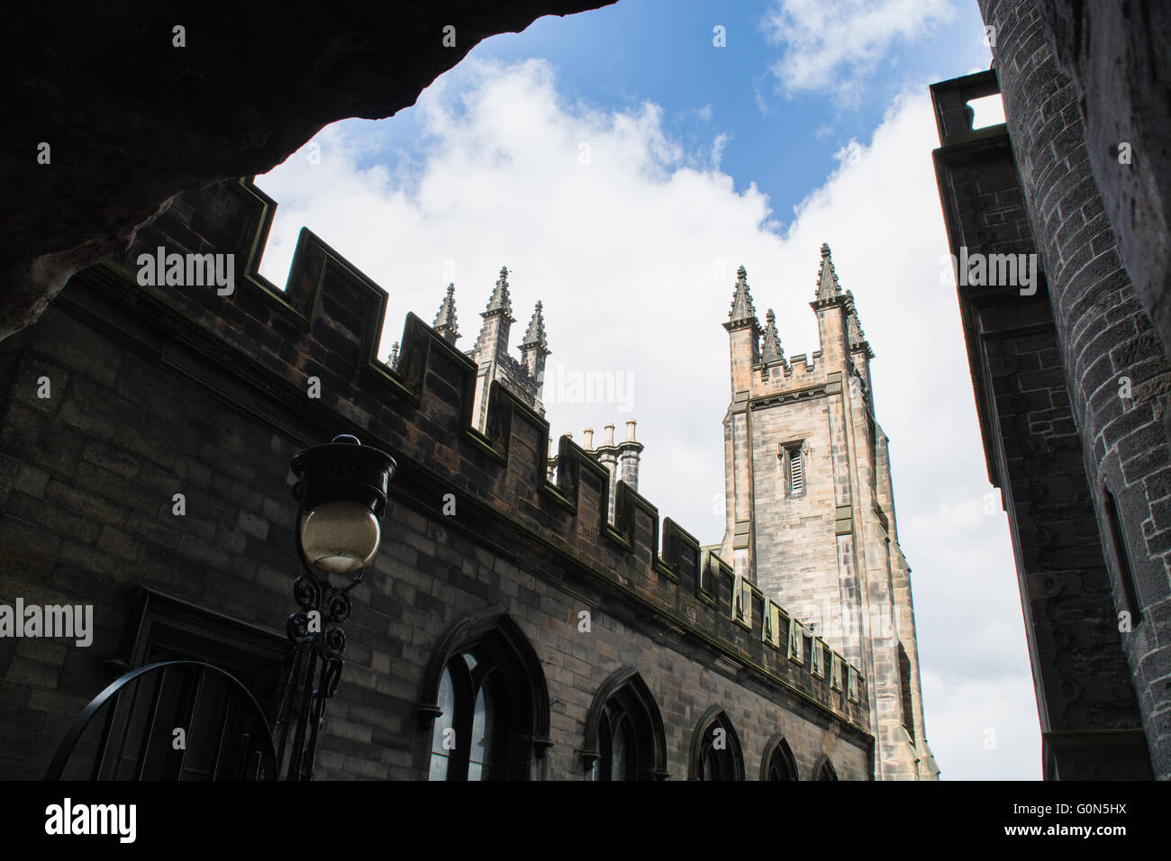 The Assembly Hall towers in Edinburgh from one of the famous close off the Royal Mile Stock Photo