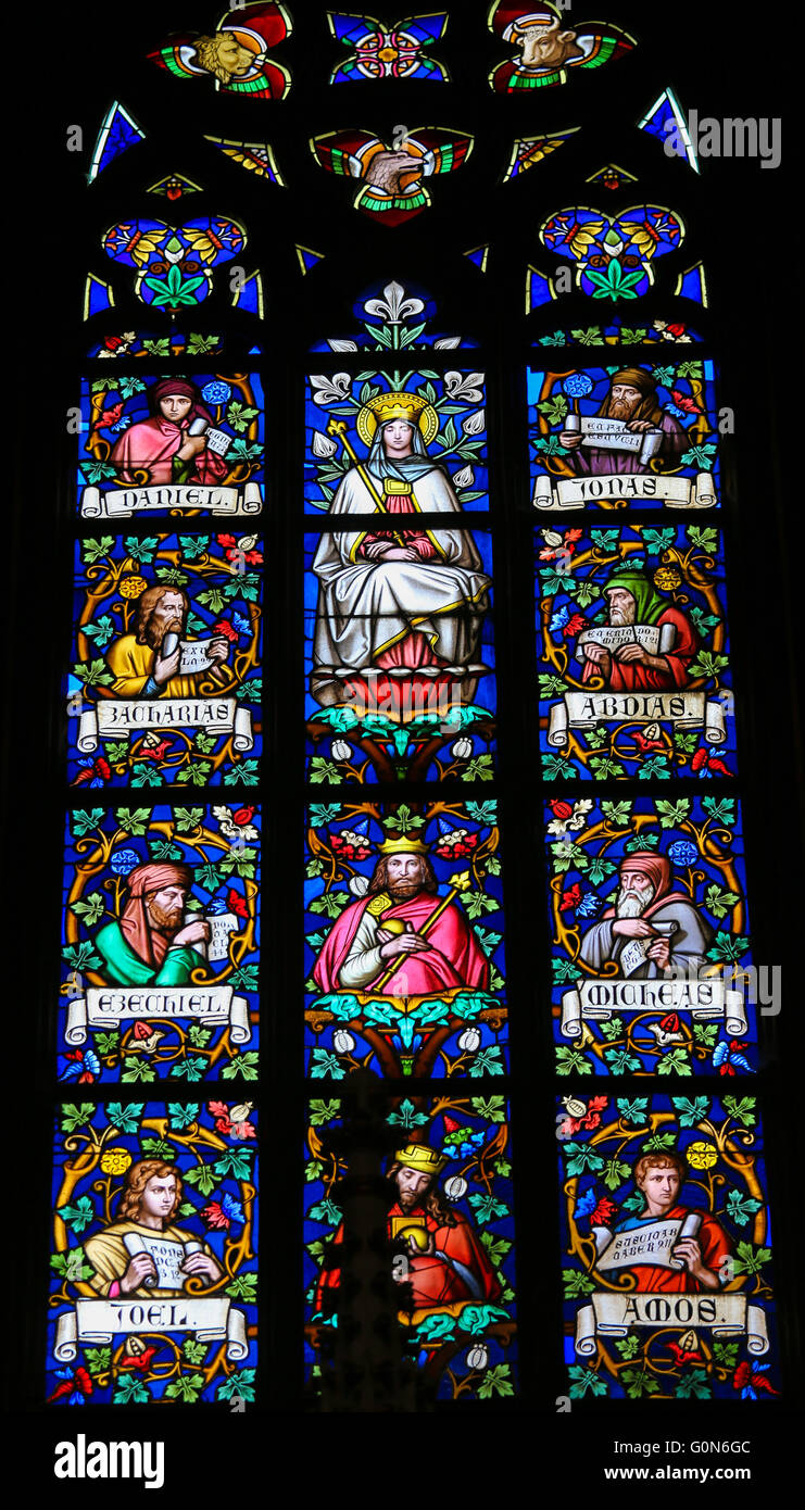 Stained Glass window in St. Vitus Cathedral, Prague, depicting Mother Mary and various Prophets. Stock Photo