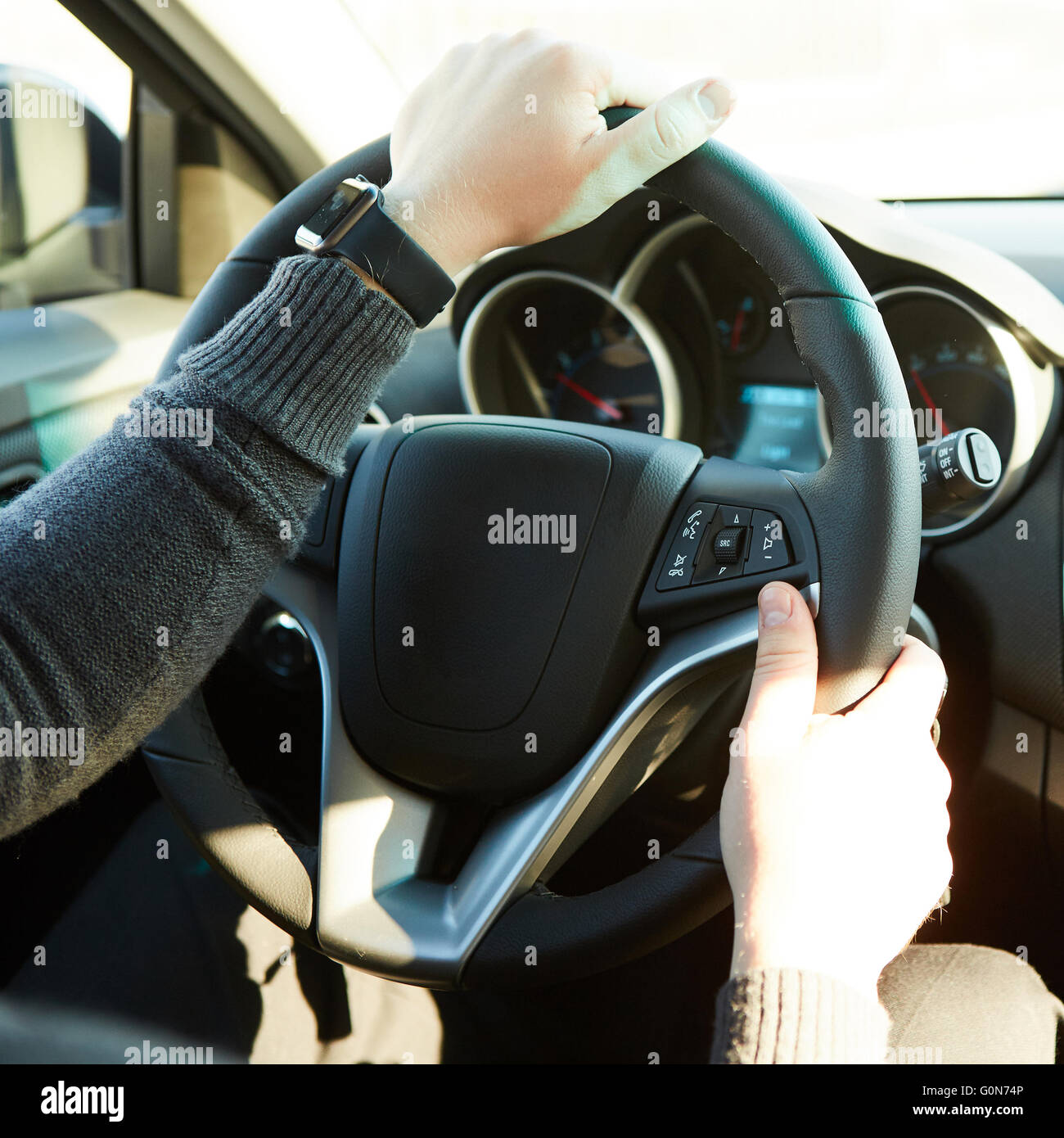 Hand holding steering wheel hi-res stock photography and images - Alamy