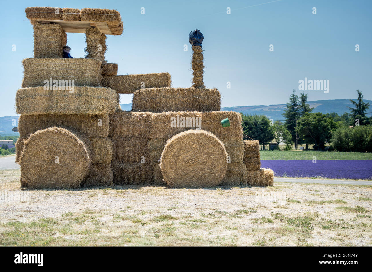 Tractor in plowed field Stock Photo - Alamy