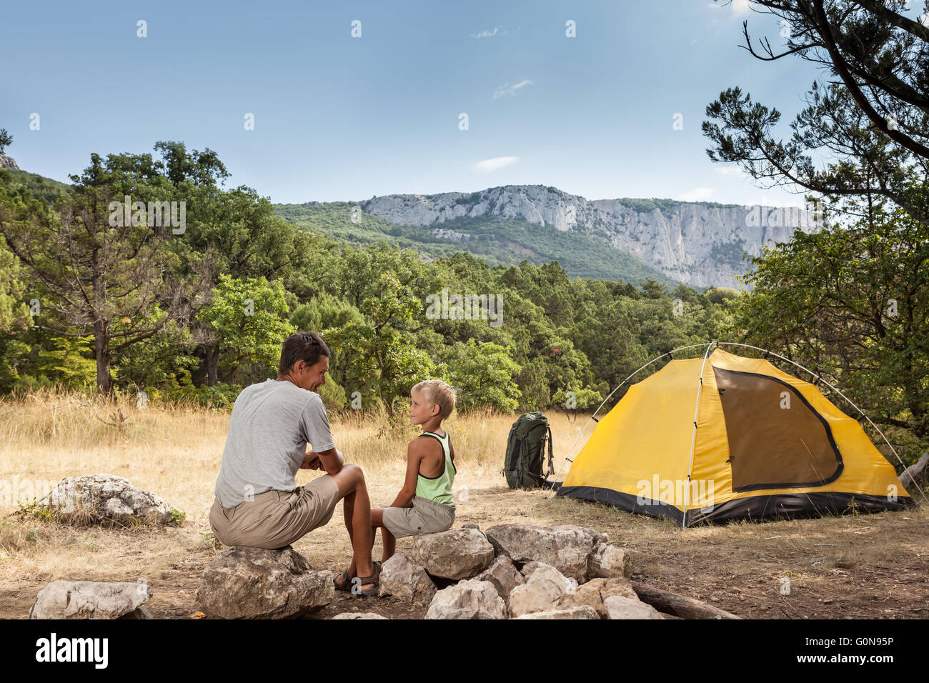 Father with son in the summer camping Stock Photo