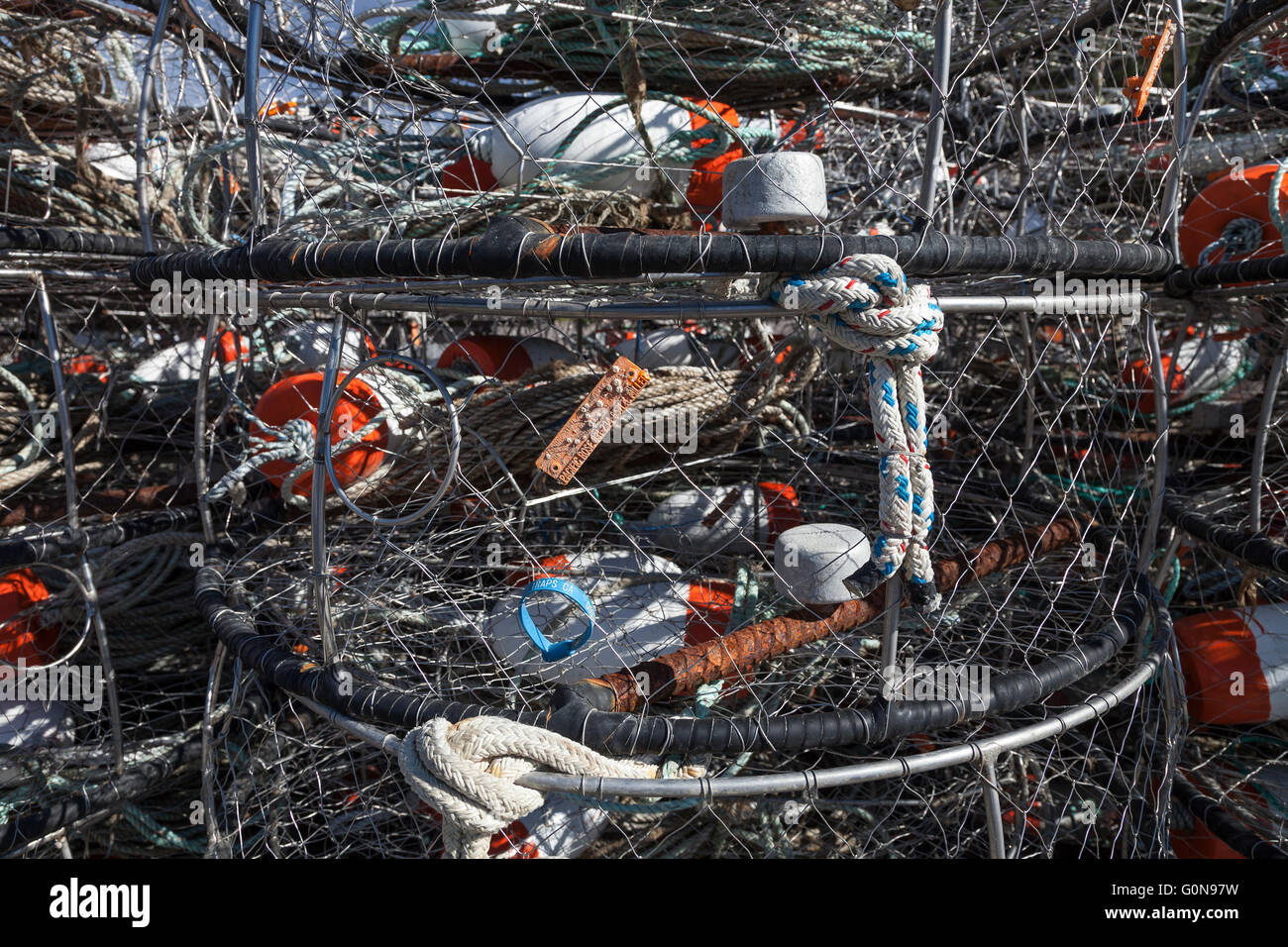 Lobster trap on Pacific shore Stock Photo